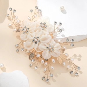 Handmade flower hair clip with white chiffon petals, gold leaves, pearls and rhinestones