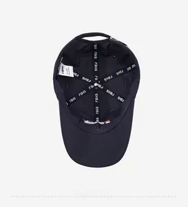 Detail view of cotton baseball cap interior featuring FBKS logo tape and 100% cotton label