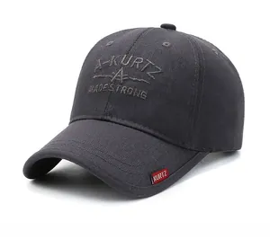 Detail of dark gray cotton baseball cap featuring high-quality 3D embroidery and side label