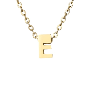 Macro shot of 18K gold plated stainless steel letter E pendant on a classic link chain