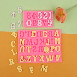 Pink silicone alphabet and number molds for chocolate and fondant cake decoration