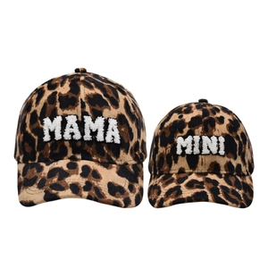 Detail of leopard print corduroy parent-child baseball caps with MAMA and MINI embroidery