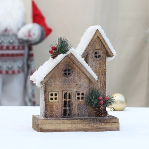 Log cabin Christmas wooden ornament with snowy roof and festive pine cone decor