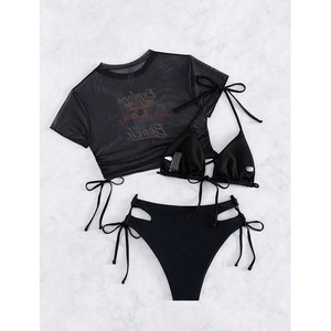 Flat lay of black 3-piece bikini set with mesh cover-up and high-waist cutout bottoms