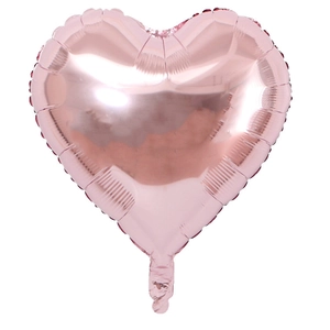 Detail view of 18-inch heart-shaped foil balloon in glossy metallic rose gold finish