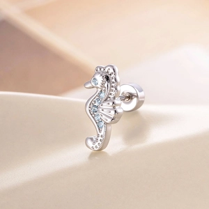 Silver seahorse cartilage stud earring with micro-set blue zircon stones