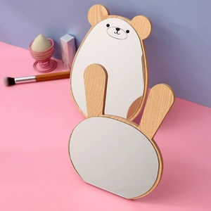 Cute cartoon bear and rabbit wooden vanity mirrors on a colorful studio background