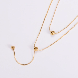 Elegant gold double-layered titanium steel necklace with three polished spherical beads