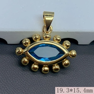 Detailed close-up of a gold-plated evil eye pendant with blue zircon and size measurements