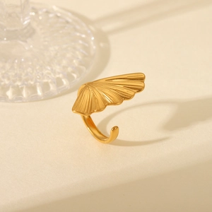 Detailed view of adjustable golden ginkgo leaf ring in a high-quality minimalist setting