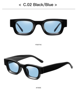 Detail view of square punk sunglasses with black frames and light blue transparent lenses