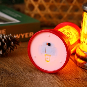 Detailed bottom view of Christmas mailbox LED lantern with switch and battery cover