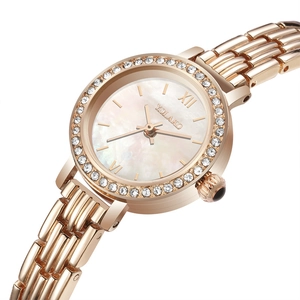 Elegant rose gold women's watch with mother of pearl dial and rhinestone bezel