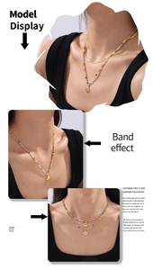 Detail of layered gold shell pendant necklace and colorful beaded chain on a female model