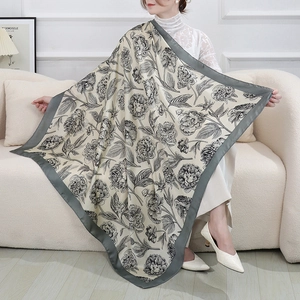 Off-white square scarf with realistic gray floral prints and dark gray borders