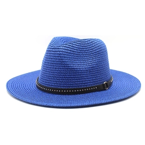 Bright blue woven straw sun hat with black band and gold studs for beach vacations