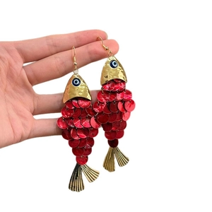 Vintage style red fish dangle earrings with gold tassels and shell accents for women