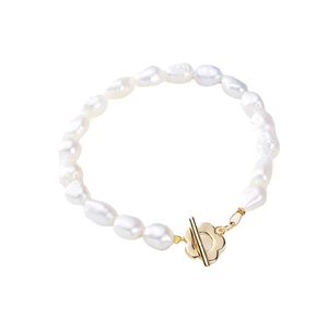 Elegant natural freshwater pearl bracelet featuring a gold petal-shaped OT toggle clasp