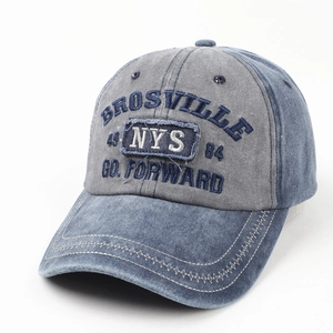 Detail of NYS embroidery and washed denim texture on vintage baseball cap