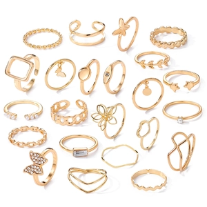 22-piece bohemian gold ring set with butterfly, pearl, and star motifs for women