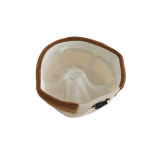 Kids corduroy docker hat in beige and caramel with adjustable drawstring toggle