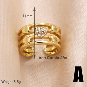 Detailed view of a gold-plated irregular ring with heart-shaped zircons and dimensions
