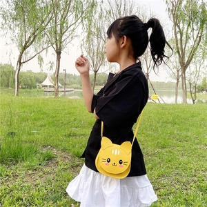 Cute yellow cartoon cat crossbody bag for children with adjustable shoulder strap