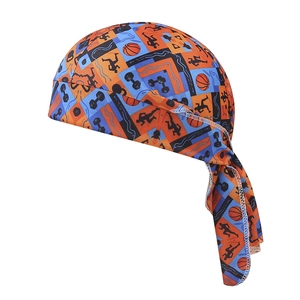 Detail of orange and blue paisley durag with athletic silhouette prints and fine stitching