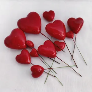 Red heart-shaped foam pick ornaments in various sizes for floral DIY crafts and cakes
