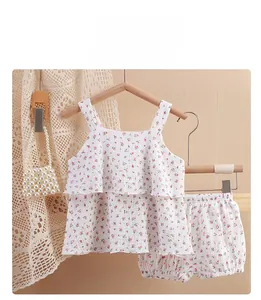 Detail showing floral cotton double-layered gauze texture on toddler girl summer set
