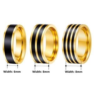 Polished gold stainless steel rings with black enamel stripes in 6mm and 8mm widths