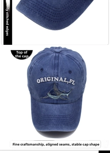 Detail of washed cotton baseball cap featuring shark embroidery and stitching work