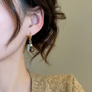 Tiger eye stone puppy tassel hoop earrings with gold plating and vintage beads