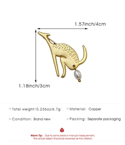 Detailed view of matte gold kangaroo brooch with pearl drop and dimensions of 4cm x 3cm