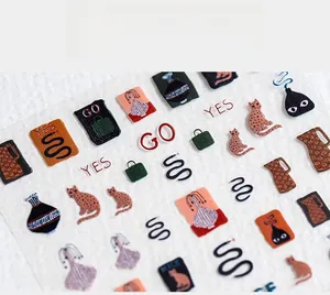 Close-up of 5D thin nail art stickers with vintage graffiti cats and flower vases