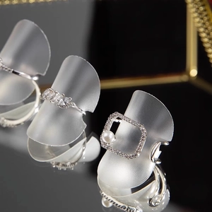 S925 silver rings with marquise zircon and pearl on professional display stands