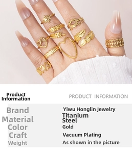 Detail view of gold titanium steel ring set with heart and leaf designs and size specs