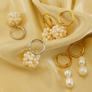 18k gold plated stainless steel hoop earrings with natural pearl clusters on silk fabric