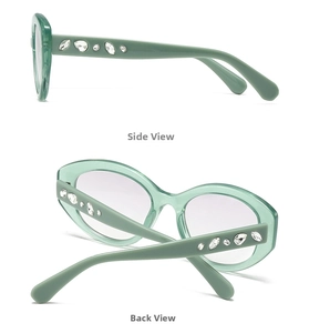 Detail of trendy oval sunglasses featuring rhinestone-encrusted temples in Morandi green