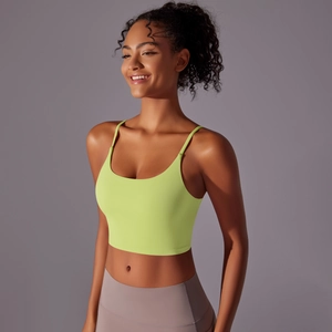 Detail of neon yellow high-impact sports bra with thin straps and U-shaped neckline