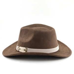 Detailed macro shot of the brown felt fedora hat with white strap and gold metal buckle