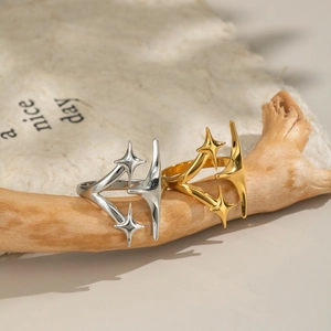 Star-shaped 18K gold and silver stainless steel rings in a stylish minimalist design
