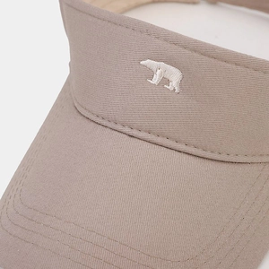 Close-up of white bear embroidery on breathable khaki cotton open top sun visor hat