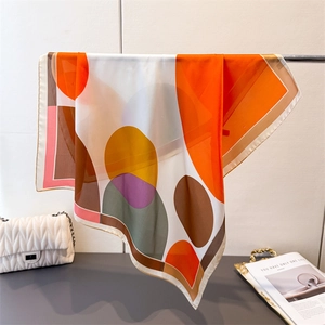 Silk-feel square scarf with colorful geometric dot patterns and brown border trim