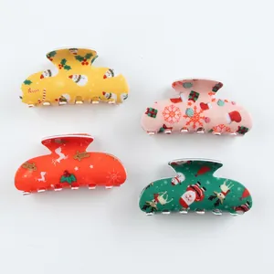 Christmas hair claw clips set with Santa and reindeer patterns for festive styling