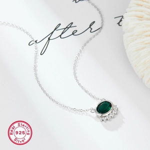 Elegant 925 sterling silver necklace with oval green zircon and sparkling accents