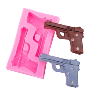 Pink 3D pistol silicone mold for handmade soap, candles, and baking chocolate crafts