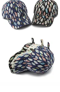 Detailed close-up of colorful feather patterns on casual baseball caps for men and women