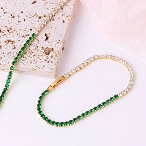 Elegant gold-plated emerald and clear zircon jewelry set with necklace and bracelet