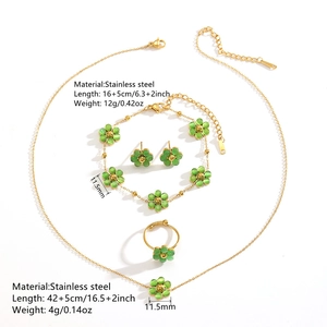 Golden stainless steel jewelry set featuring green cat-eye stone flower pendants